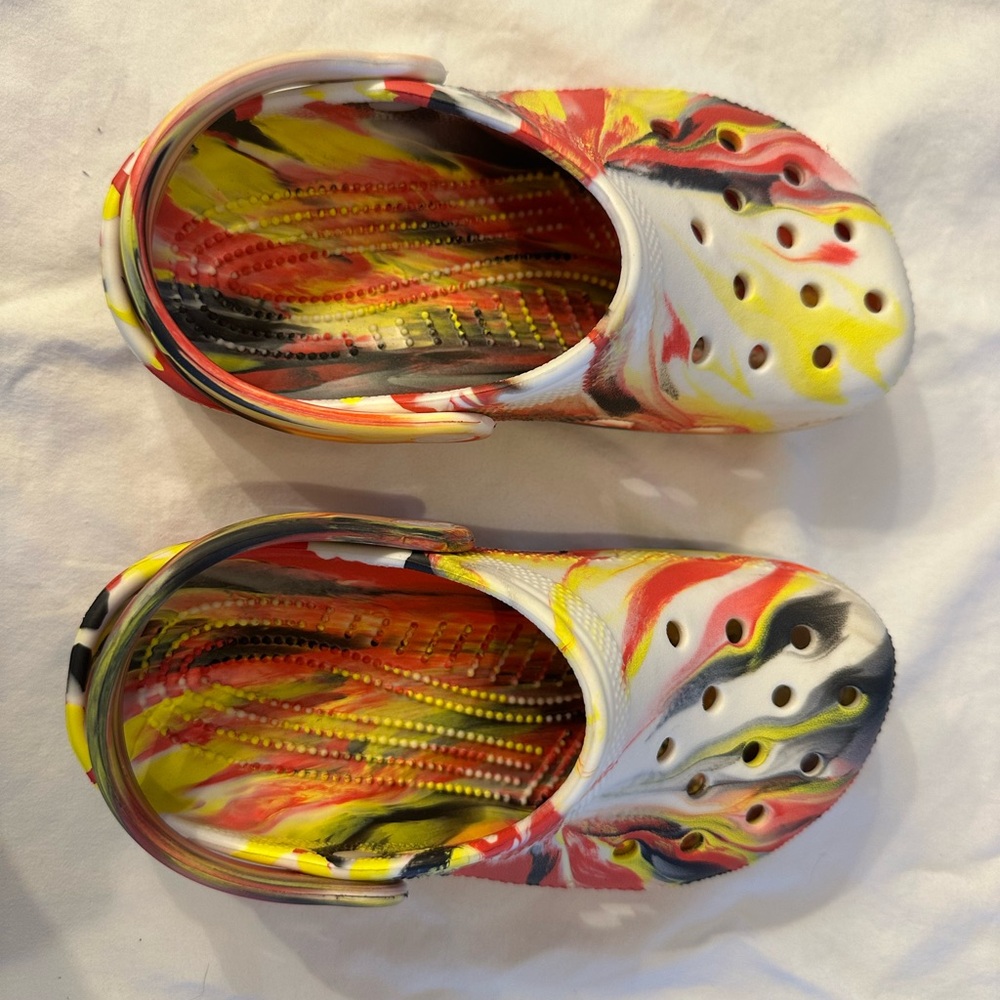 Crocs Kids Lightweight Slip-On Clogs in Red Yellow Black Swirl